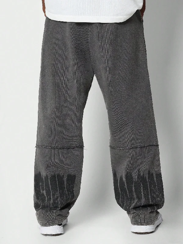 Wide Fit Washed Jogger With Grunge Print And Exposed Seam Detail